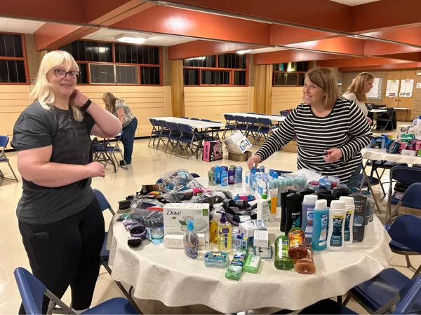 Sorting donations at the Comfort Closet with People Helping People