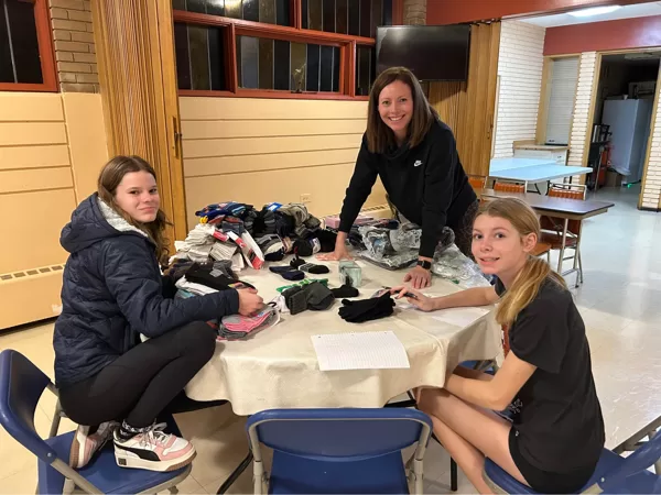 Sorting donations at the Comfort Closet with People Helping People